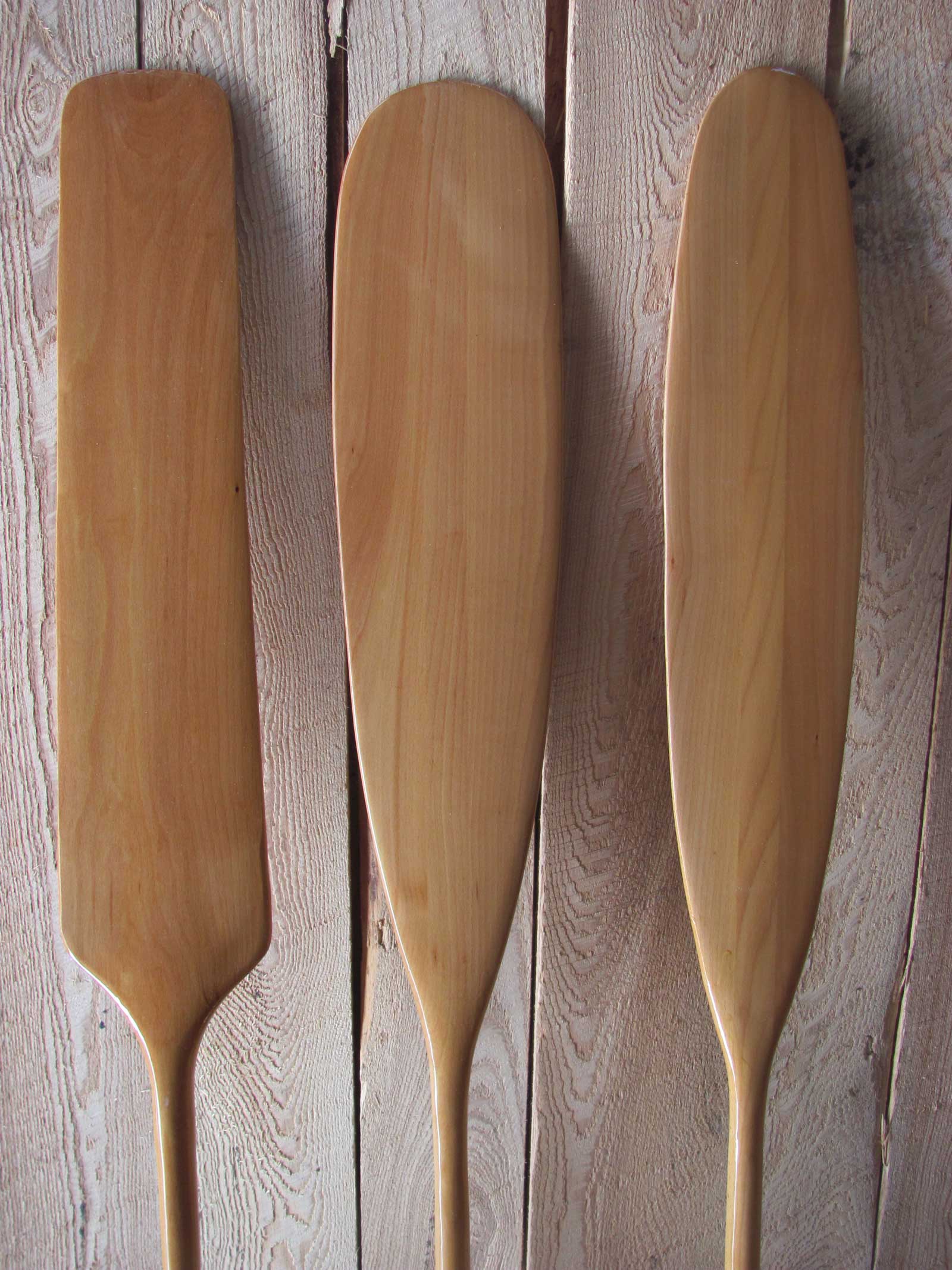 Voyageur, Beaver and Otter paddle in beech wood (from left)